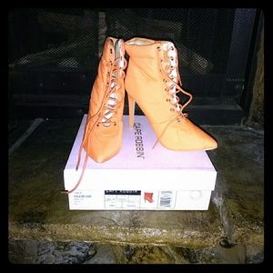 Never worn heeled boots